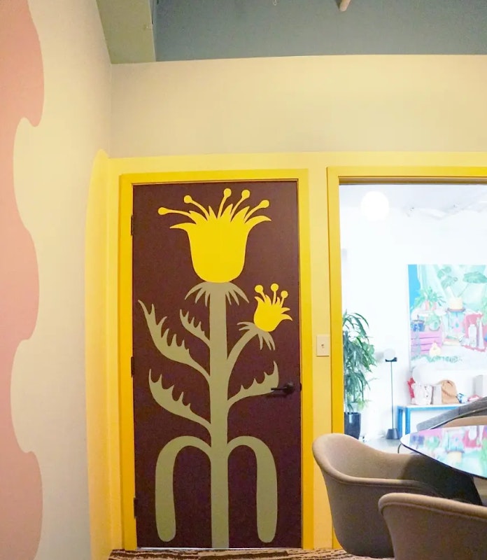 PABLO HONEY, DRIVE-THRU SAFARI, LOBBY SCENE, warm, bright yellow, soft green, dark, warm purple-red paint colors by Backdrop. – Bold, Yellow, Bold, Green, Dark, Purple, Red, Office, Accents, Door, Trim, Shapes, Art/Mural