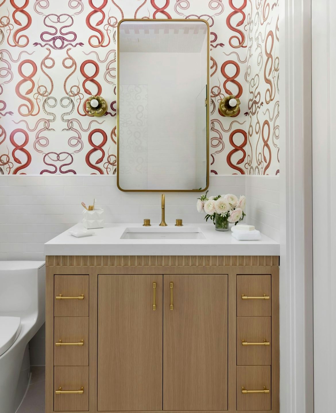 giove features a stunning design of hand-drawn snakes that are intertwined together. this mesmerizing pattern is inspired by ancient mythological symbols and is sure to add a touch of drama to any room.  by Backdrop. – Add Me, Bathroom, Accents, Wallcoverings