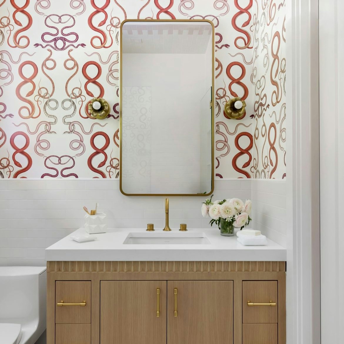 giove features a stunning design of hand-drawn snakes that are intertwined together. this mesmerizing pattern is inspired by ancient mythological symbols and is sure to add a touch of drama to any room. by Backdrop. – Add Me, Bathroom, Accents, Wallcoverings