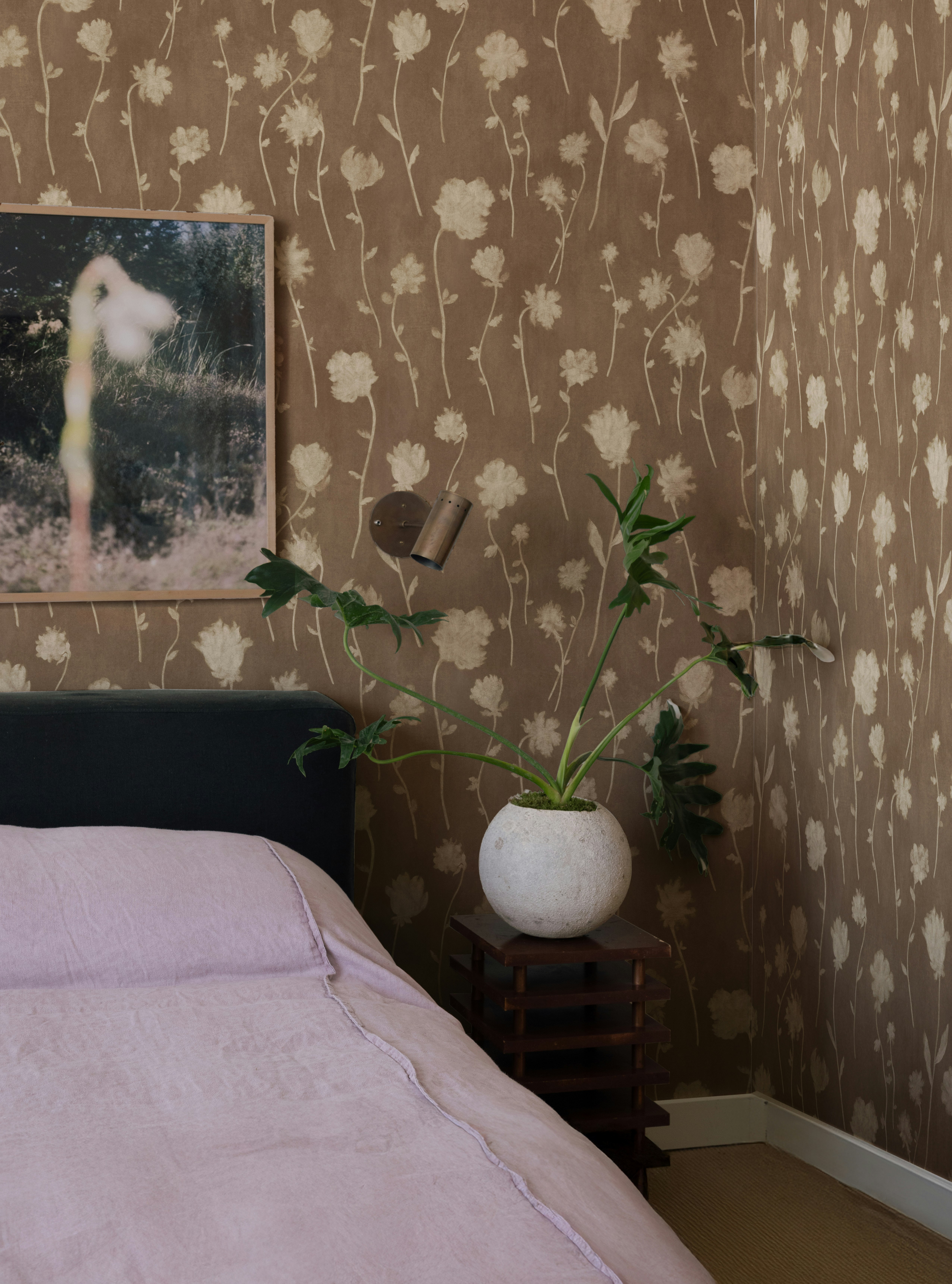 atmospheric and gestural, before midnight is a romantic floral design with a barely there sensibility. created in our studio as a subtractive charcoal drawing, this mid-scale design is like a meadow caught at dusk: moody, atmospheric, and quietly seductive.  by Backdrop. – Bedroom, Wallcoverings